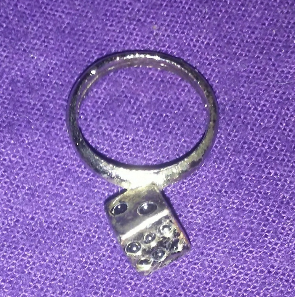 A Faux silver dice ring.